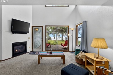 Large windows fill the living spaces with natural light while - photo 4