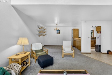 Large windows fill the living spaces with natural light while - photo 6
