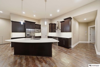 Stunning Wilderness Ridge home backing to Hole #7 of the golf - photo 4