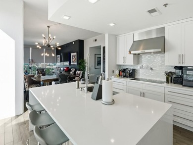 Rare bespoke PENTHOUSE has it all! Floor-to-ceiling windows