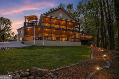 This exceptional lakefront retreat offers the perfect blend of - photo 2