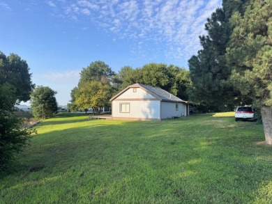 Nestled on a generously sized lot in a quiet area of Johnson Lake - photo 2
