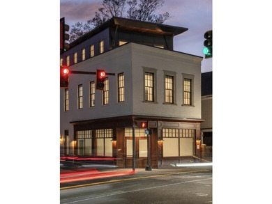 A rare opportunity to own a newly constructed mixed-use - photo 1