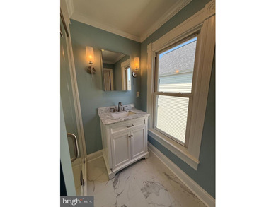 Experience elevated coastal living in this beautiful fully - photo 35