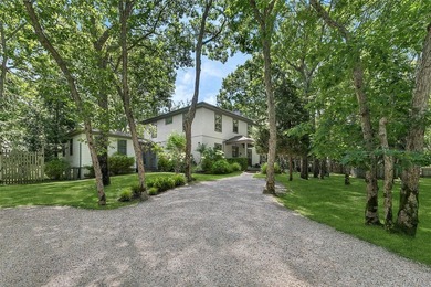 Secluded Retreat Between the Villages Set on .92 acres abutting - photo 1