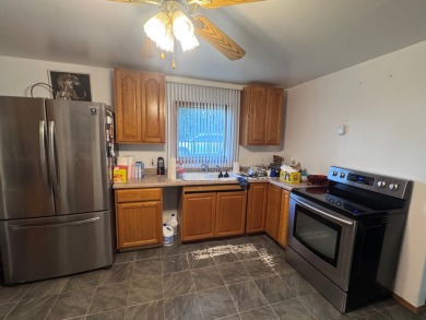 Nestled on a generously sized lot in a quiet area of Johnson Lake - photo 3