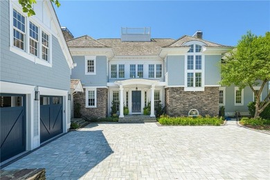 Nestled within the private gates of Carnegie Harbor, one of - photo 4