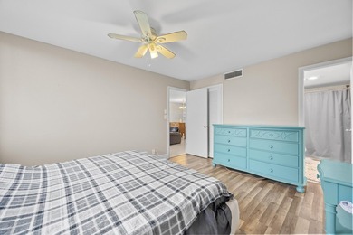 Wake up to tranquil lake and golf course views in this - photo 21