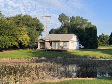 Nestled on a generously sized lot in a quiet area of Johnson Lake - photo 1