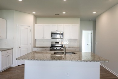 Welcome to this 4-bedroom, 2-bath home with a 2-car garage - photo 5