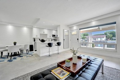 This one-of-a-kind fully renovated ground floor waterfront - photo 12