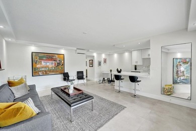 This one-of-a-kind fully renovated ground floor waterfront - photo 13