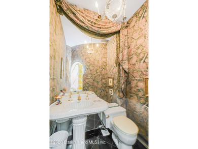 Nestled in prestigious Grymes Hill, this timeless residence is - photo 14