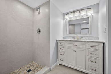Beautifully remodeled, turnkey 2nd-floor condo in the highly - photo 15