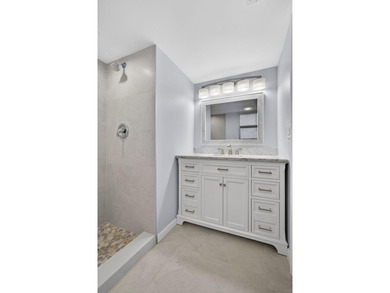 Beautifully remodeled, turnkey 2nd-floor condo in the highly - photo 16