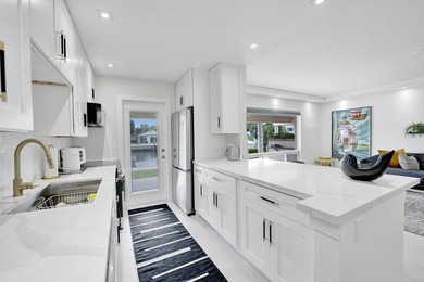This one-of-a-kind fully renovated ground floor waterfront - photo 19