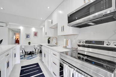 This one-of-a-kind fully renovated ground floor waterfront - photo 21