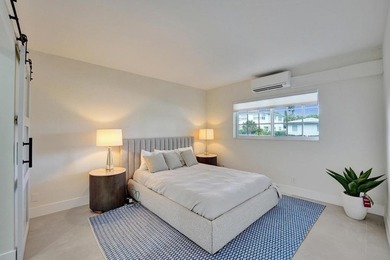 This one-of-a-kind fully renovated ground floor waterfront - photo 22
