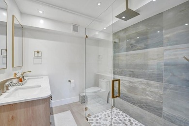 This one-of-a-kind fully renovated ground floor waterfront - photo 24