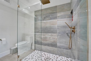 This one-of-a-kind fully renovated ground floor waterfront - photo 26