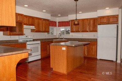 Situated on 3.89 acres in the desirable Rosita Hills near