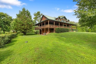 This stunning riverfront log home on the premier trout-filled - photo 5