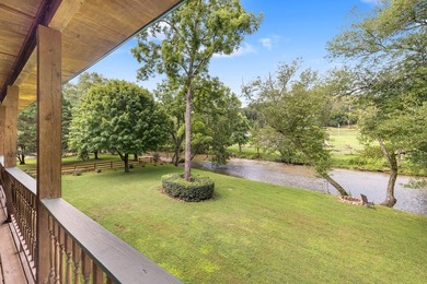 This stunning riverfront log home on the premier trout-filled - photo 8