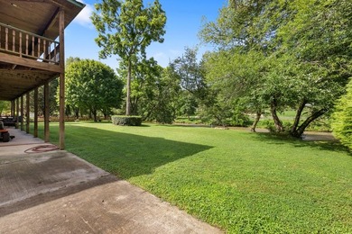This stunning riverfront log home on the premier trout-filled - photo 9