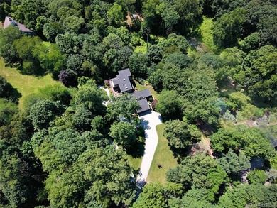 KoiHaus, a mid-century modern home on 3.16 acres, tucked away on - photo 3