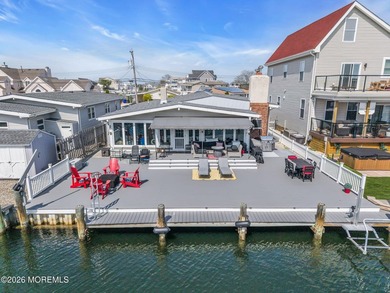 This Very Well-Maintained Waterfront Home offers a desirable - photo 1