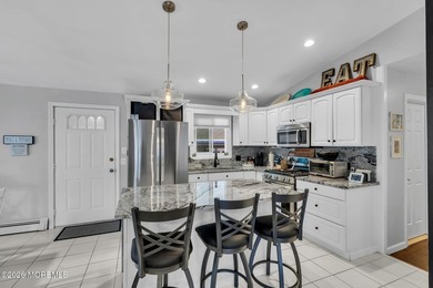 This Very Well-Maintained Waterfront Home offers a desirable - photo 9
