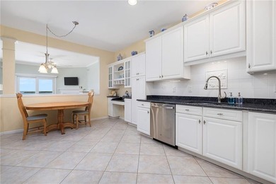 We invite you to explore this expansive end-unit - photo 4
