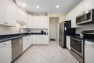 We invite you to explore this expansive end-unit - photo 7