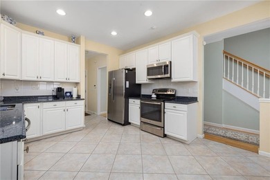 We invite you to explore this expansive end-unit - photo 9