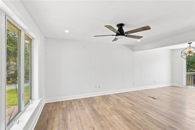Beautifully renovated from top to bottom, this 3-4 bed, 2 full - photo 9