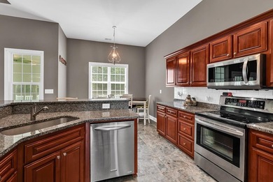 Welcome to this beautifully maintained custom-built home - photo 7