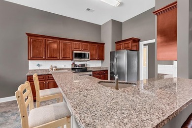 Welcome to this beautifully maintained custom-built home - photo 10