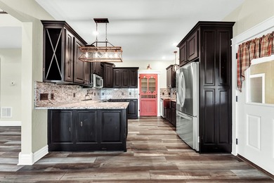 Enhanced price! Beautifully crafted home on 13 acres m/l just - photo 11
