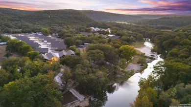 Tucked along the banks of the Guadalupe River, this beautifully - photo 3