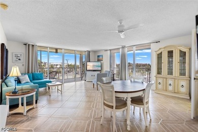 Corner residence with under building parking included. The unit - photo 2