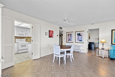 Corner residence with under building parking included. The unit - photo 5