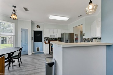 WELCOME HOME TO THIS BEAUTIFULLY UPDATED WATERFRONT PROPERTY - photo 11