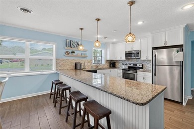 Experience the ultimate in coastal iving with this exceptional - photo 14