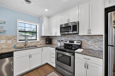 Experience the ultimate in coastal iving with this exceptional - photo 15