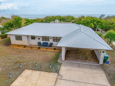 Experience the ultimate in coastal iving with this exceptional - photo 59