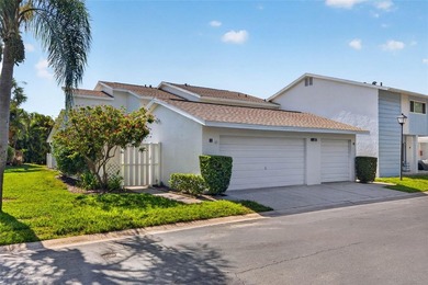 Tucked within the waterfront community of Mariners Pass, this - photo 1