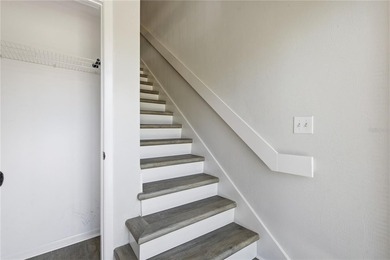 Welcome to this beautifully renovated second-floor condo in the - photo 3