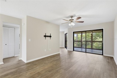 Welcome to this beautifully renovated second-floor condo in the - photo 8