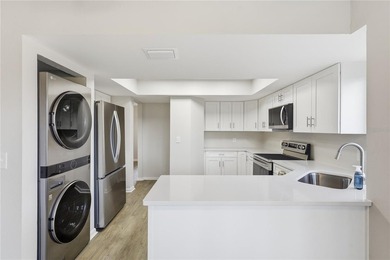 Welcome to this beautifully renovated second-floor condo in the - photo 10