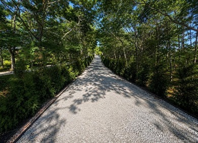 Set on 1.25 professionally landscaped acres bordering protected - photo 18